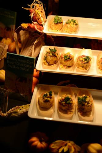 Crab cake bites arranged on a serving tray