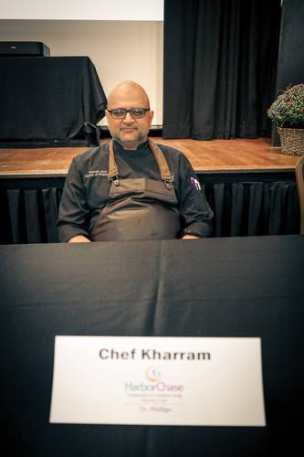 Chef Kharram of HarborChase poses at his station