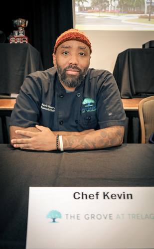 Chef Patrick of The Mayflower smiles warmly at the table