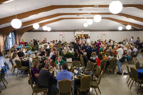 Guests fill the hall during the seated dinner program