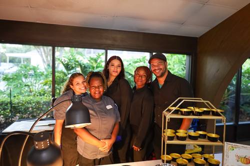 Legacy Pointe kitchen staff pose together smiling